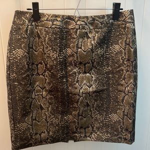 Animal print gold and black mini skirt